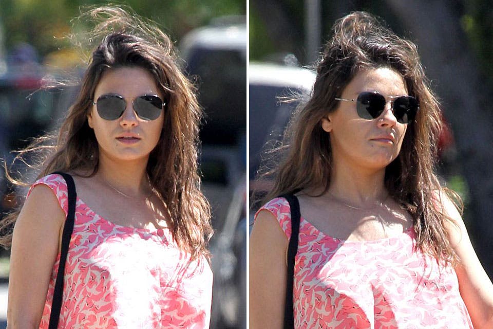 Embarazada, Mila Kunis fue sorprendida sin maquillaje y con los pelos como salida de la cama