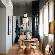 Mix de tendencias en el espacio de Gaby Orlando: comedor circular, divisor que deja ver más allá y un dormitorio protagonista con textiles, arte y verde natural 