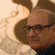 Quino, junto a su mayor creación, Mafalda.