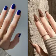 Manos con uñas en azul y marrón