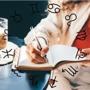 La rueda zodiacal, con los símbolos de los 12 signos astrales y una chica escribiendo en su agenda.
