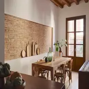 Los revestimientos de piedras, maderas y materiales industriales serán los protagonistas en 2026