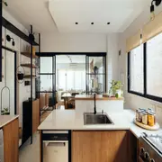 La división entre el living y la cocina es una estrategia de diseño además de una decisión funcional.