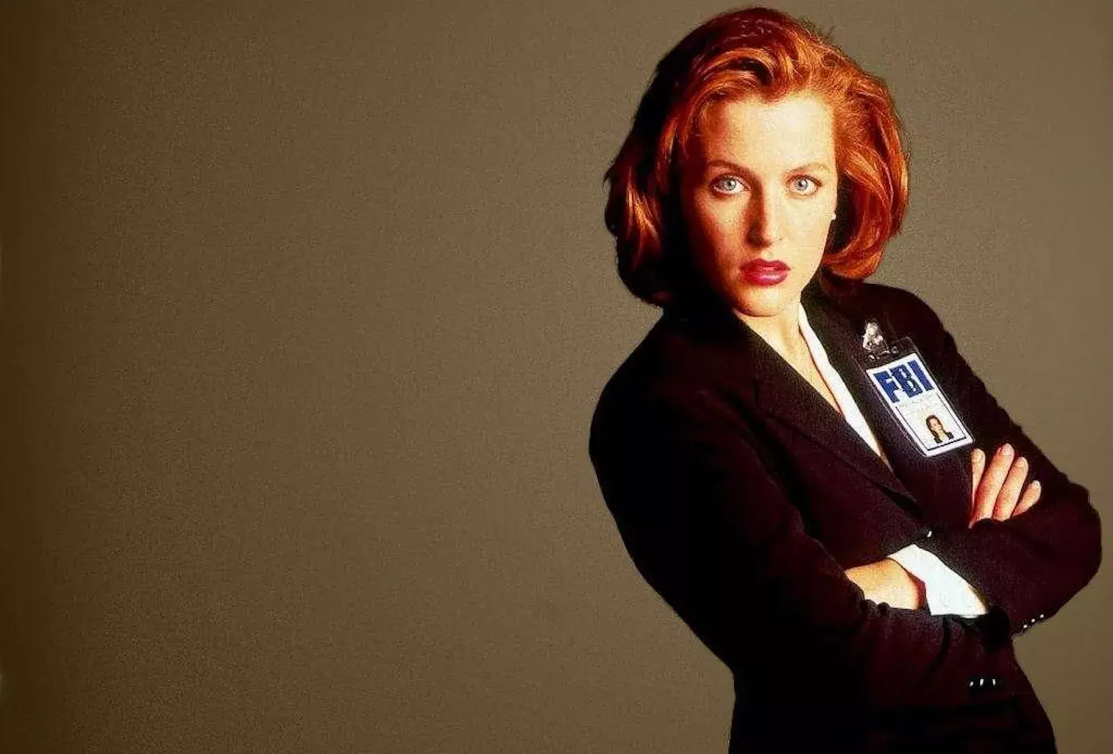 Gillian Anderson como Dana Scully