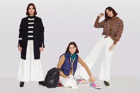 Jean (Las Pepas). LOOK 1: Tapado de paño y suéter (Perramus), polera (A Core Collection), botas (Camelia). LOOK 2: Chaleco puffer (The New Black), pollera de punto (The New Black), pañuelo (Rapsodia), zapatillas (Converse), mochila (Perramus). LOOK 3: Camisa y polera (Levi’s), zapatos (Cruz Esquivel). 