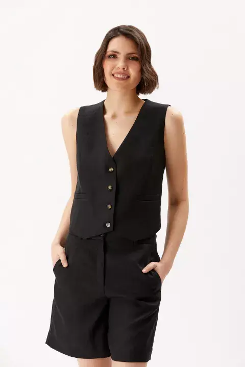 Awada: con bermudas para los días de calor Awada: con bermudas para los días de calor