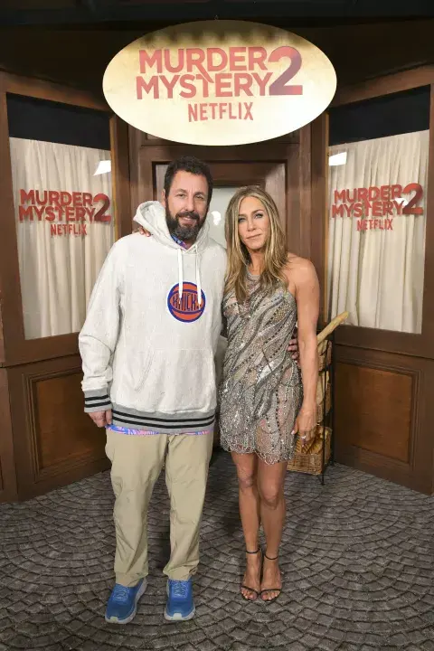 Jennifer Aniston y Adam Sandler. Jennifer Aniston y Adam Sandler.