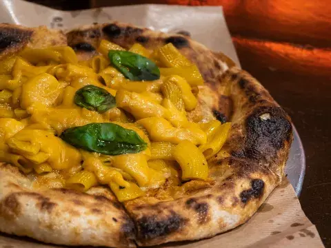 The pizza OTL tiene una opción de topping inspirada en el clásico mac&cheese. The pizza OTL tiene una opción de topping inspirada en el clásico mac&cheese.