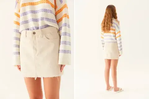 Tiro medio y de color crema, ideal para el verano. Es de Furzai. Tiro medio y de color crema, ideal para el verano. Es de Furzai.