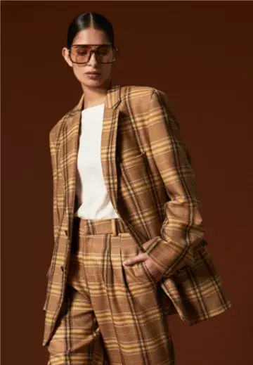 Conjunto de blazer y pantalón. Perramus, $490.000 y $150.000