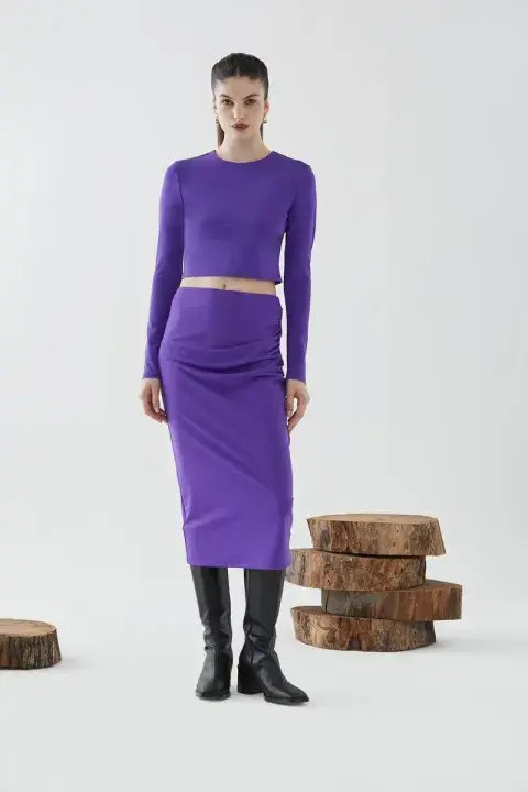 Conjunto morado de falda y remera. @ayresoficial Conjunto morado de falda y remera. @ayresoficial