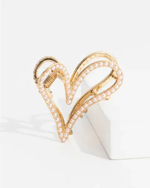 Un toque más coquette y glam, este en forma de corazón y con perlas es de Isadora. Sale 3.200. Un toque más coquette y glam, este en forma de corazón y con perlas es de Isadora. Sale 3.200.