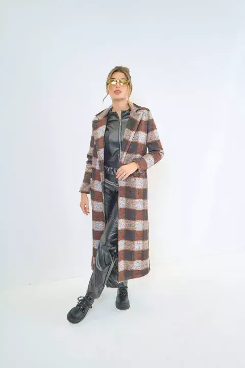 El tapado con tela cuadrillé es una gran opción porque será tendencia esta temporada. @prussia_moda El tapado con tela cuadrillé es una gran opción porque será tendencia esta temporada. @prussia_moda
