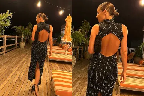 La prenda que era bien ceñida al cuerpo tenía escote y trajo en la parte posterior, dándole un toque bien sexy al estilismo La prenda que era bien ceñida al cuerpo tenía escote y trajo en la parte posterior, dándole un toque bien sexy al estilismo