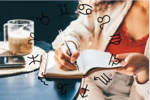 La rueda zodiacal, con los símbolos de los 12 signos astrales sobre una mujer escribiendo en su agenda. La rueda zodiacal, con los símbolos de los 12 signos astrales sobre una mujer escribiendo en su agenda.