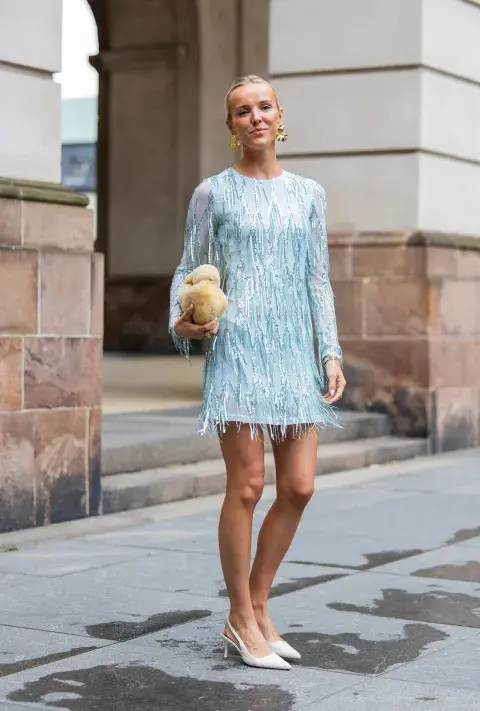 Mujer invitada a un desfile de la semana de moda en Copenhagen. Mujer invitada a un desfile de la semana de moda en Copenhagen.