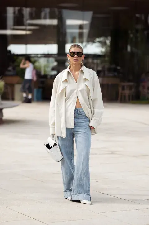 Mujer invitada a un desfile de la semana de moda en Copenhagen. Mujer invitada a un desfile de la semana de moda en Copenhagen.