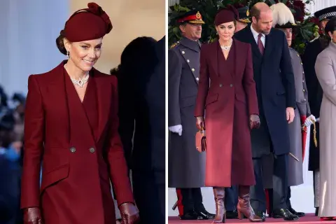 Si hablamos de la primera opción podemos decir que se trató de un gran tapado largo en color burdeos ceñido a la cintura con dos botones en color negro y detalles en las solapas frontales, creado por Alexander McQueen Si hablamos de la primera opción podemos decir que se trató de un gran tapado largo en color burdeos ceñido a la cintura con dos botones en color negro y detalles en las solapas frontales, creado por Alexander McQueen