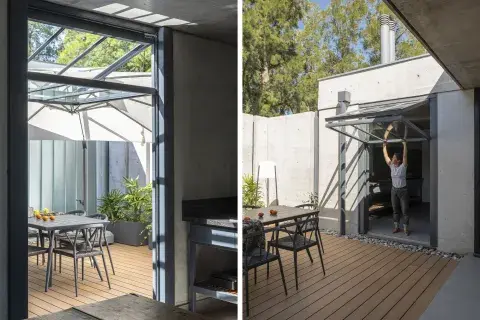 Para salir del quincho al patio se diseñó una puerta levadiza plegable que protege la abertura y funciona como un techo cuando llueve, además de que no ocupa espacio cuando está abierta. Para salir del quincho al patio se diseñó una puerta levadiza plegable que protege la abertura y funciona como un techo cuando llueve, además de que no ocupa espacio cuando está abierta.