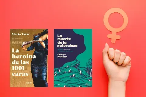 Un puño levantado y el símbolo del feminismo Un puño levantado y el símbolo del feminismo