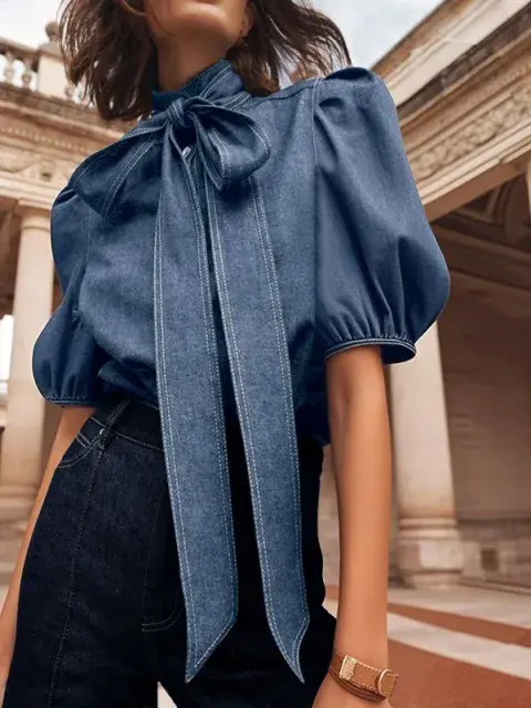 Camisa de denim anudada en el cuello Camisa de denim anudada en el cuello