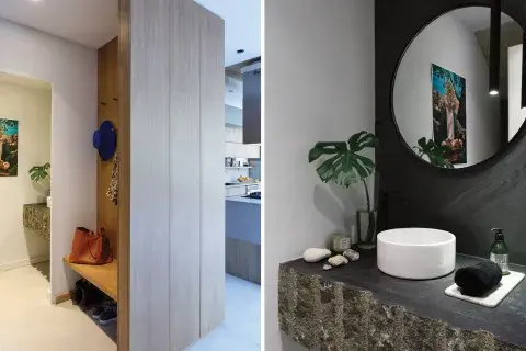 En la mesada y en la pared del espejo, se aplicó el revestimiento de piedra laminada ‘Petróleo’ (PedraFlex). Bajo la bacha, flota un bloque de granito negro Brasil con el frente sin pulir, en estado natural. Obra de Alejandro Pasquale. En la mesada y en la pared del espejo, se aplicó el revestimiento de piedra laminada ‘Petróleo’ (PedraFlex). Bajo la bacha, flota un bloque de granito negro Brasil con el frente sin pulir, en estado natural. Obra de Alejandro Pasquale.
