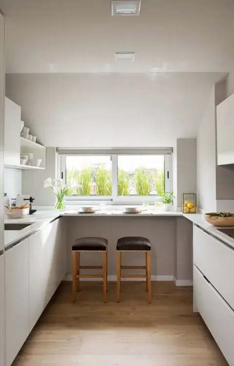 Foto de cocina con diseño en U. Foto de cocina con diseño en U.