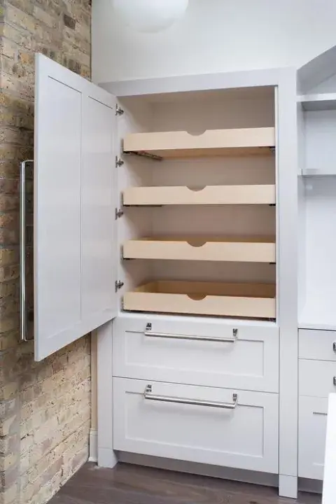 Foto de mueble con estante deslazante. Foto de mueble con estante deslazante.