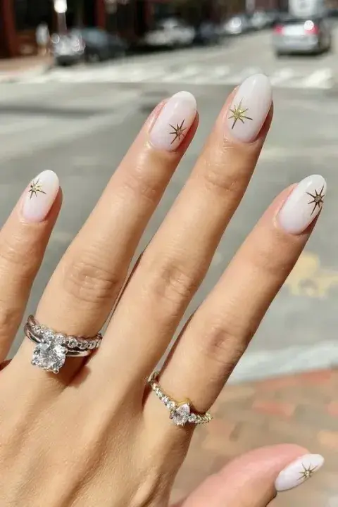 Foto de Nail Art con estrellitas. Foto de Nail Art con estrellitas.