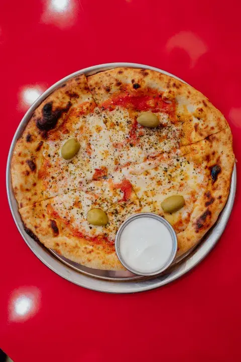 Pizza clásica de muzzarella