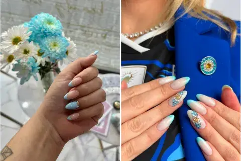 Uñas con diseños en celeste y blanco.