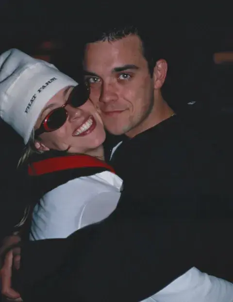 Foto de Nicole Appleton y Robbie Williams. Foto de Nicole Appleton y Robbie Williams.