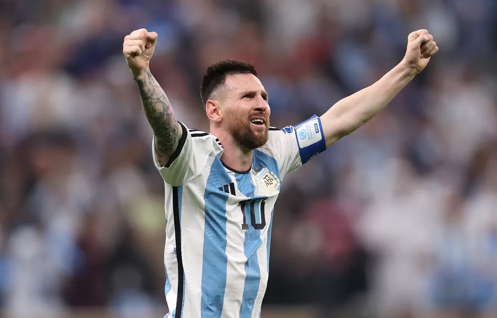 Lio Messi celebrando después de haber ganado la Copa del Mundo.
