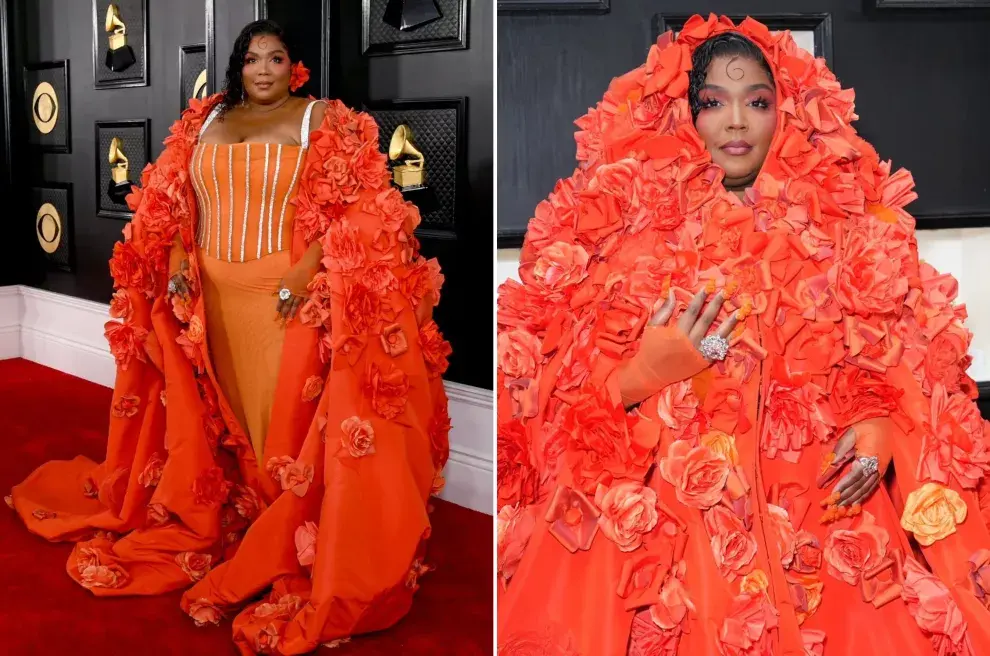 Lizzo llevó un increíble vestido naranja con una capa con flores.