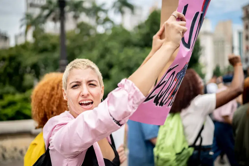 Cuáles fueron los antecedentes que dieron origen al Día Internacional de la Mujer.