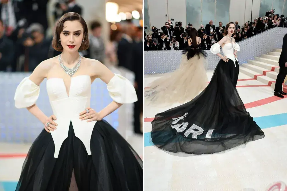 Lily Collins con su vestido de cola en el que se lee KARL diseñado por Vera Wang.