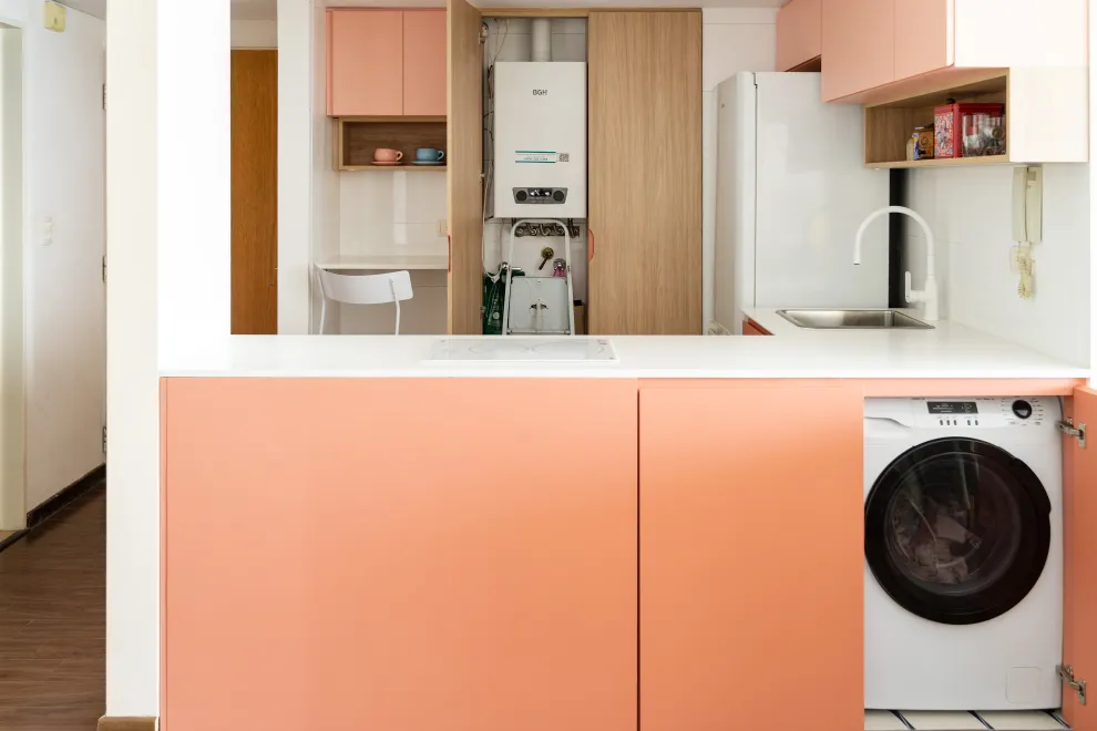 Un mueble de cocina que te permite esconder el lavarropas y la caldera.