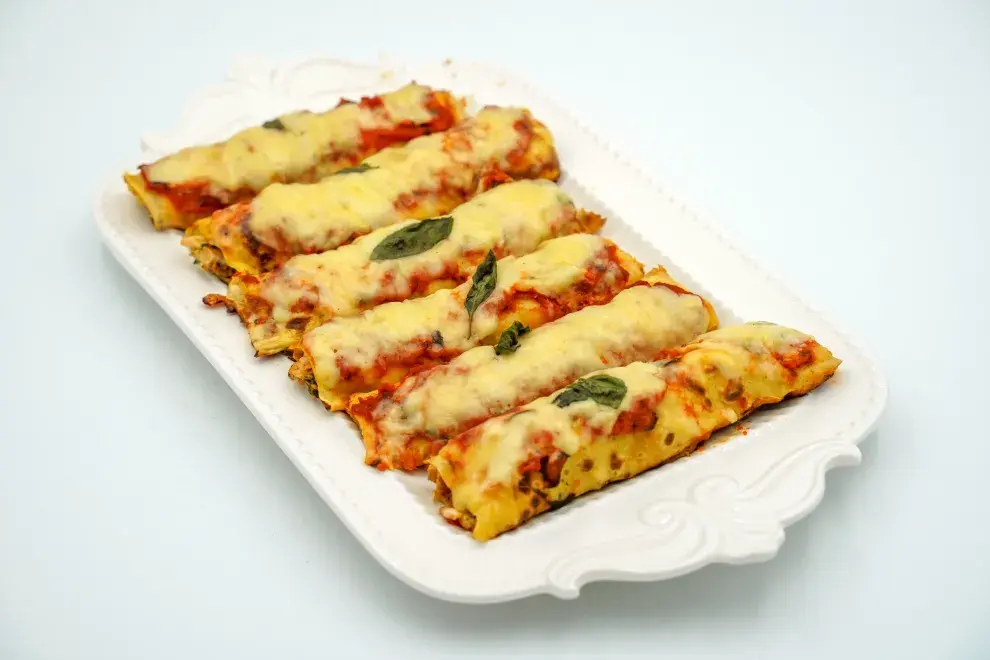 Canelones de jamón, queso y espinacas, sin harinas.