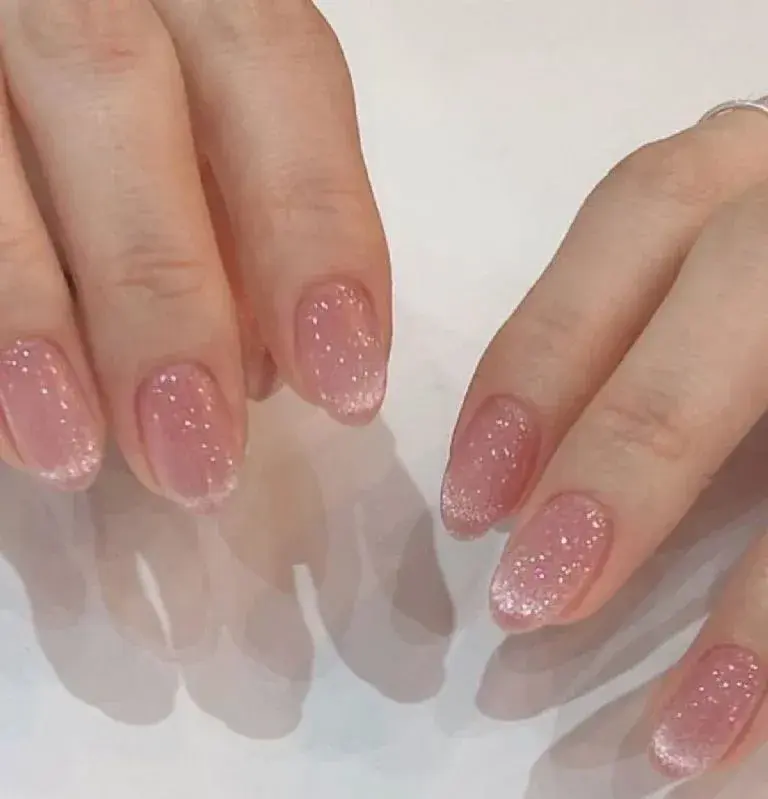 Glitter blush nails.