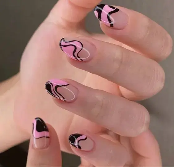 diseño de uñas rosas y negras