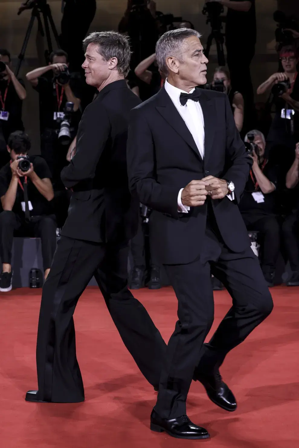 Brad Pitt y George Clooney en el Festival de Venecia.