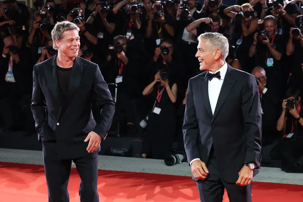 Brad Pitt y George Clooney en el Festival de Venecia.