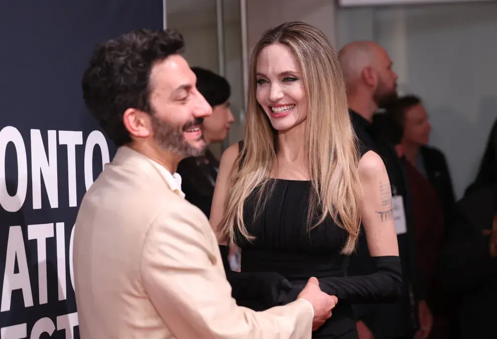 Foto de Juan Minujín y Angelina Jolie en el Festival de Cine de Toronto.