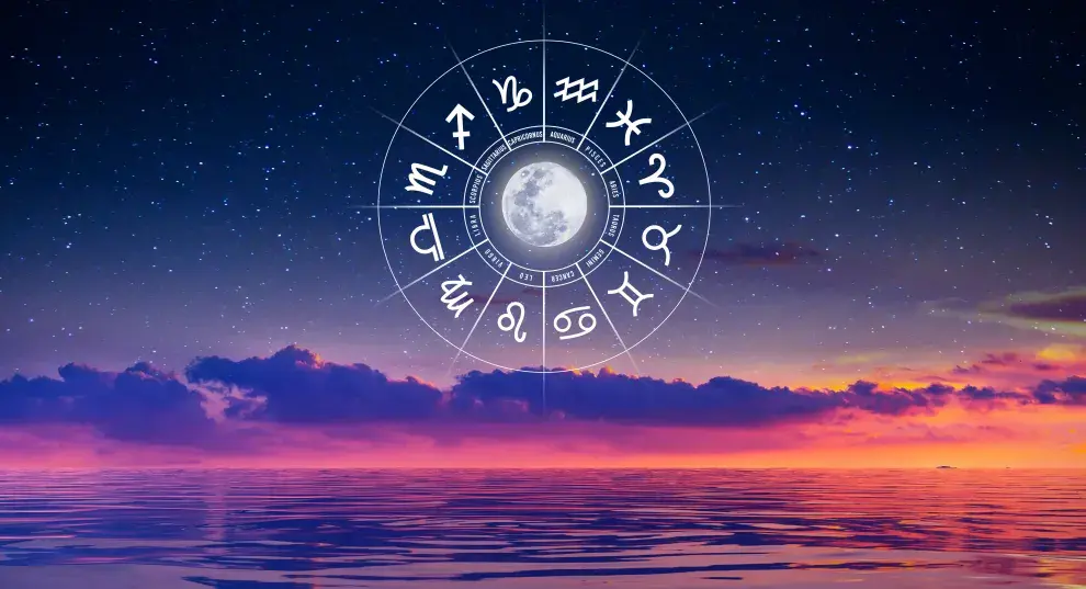 La rueda zodiacal, con los símbolos de los 12 signos astrales, sobre un claro de agua.