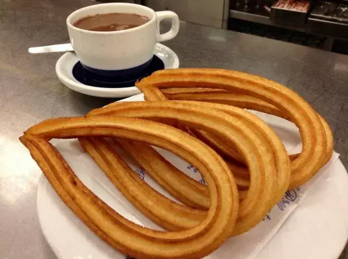 Los churros de Café Tortoni.