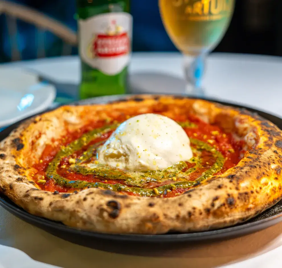 Jueves de pizza, birra y música con acento italiano en Enero Costanera