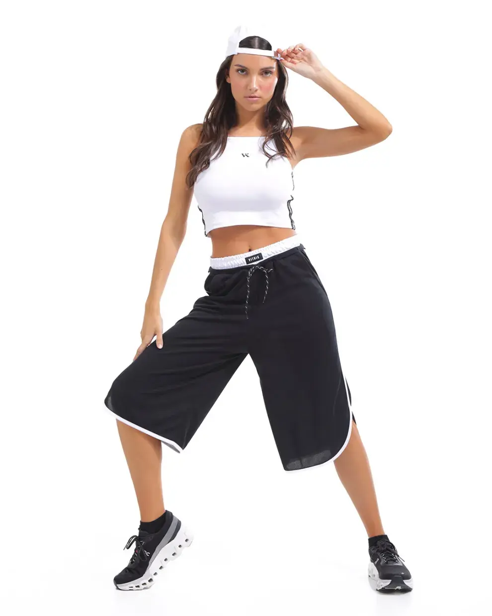 Foto de mujer con ropa deportiva.