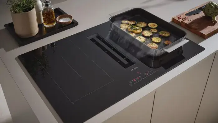 Cómo funcionan las placas con extractor incorporado