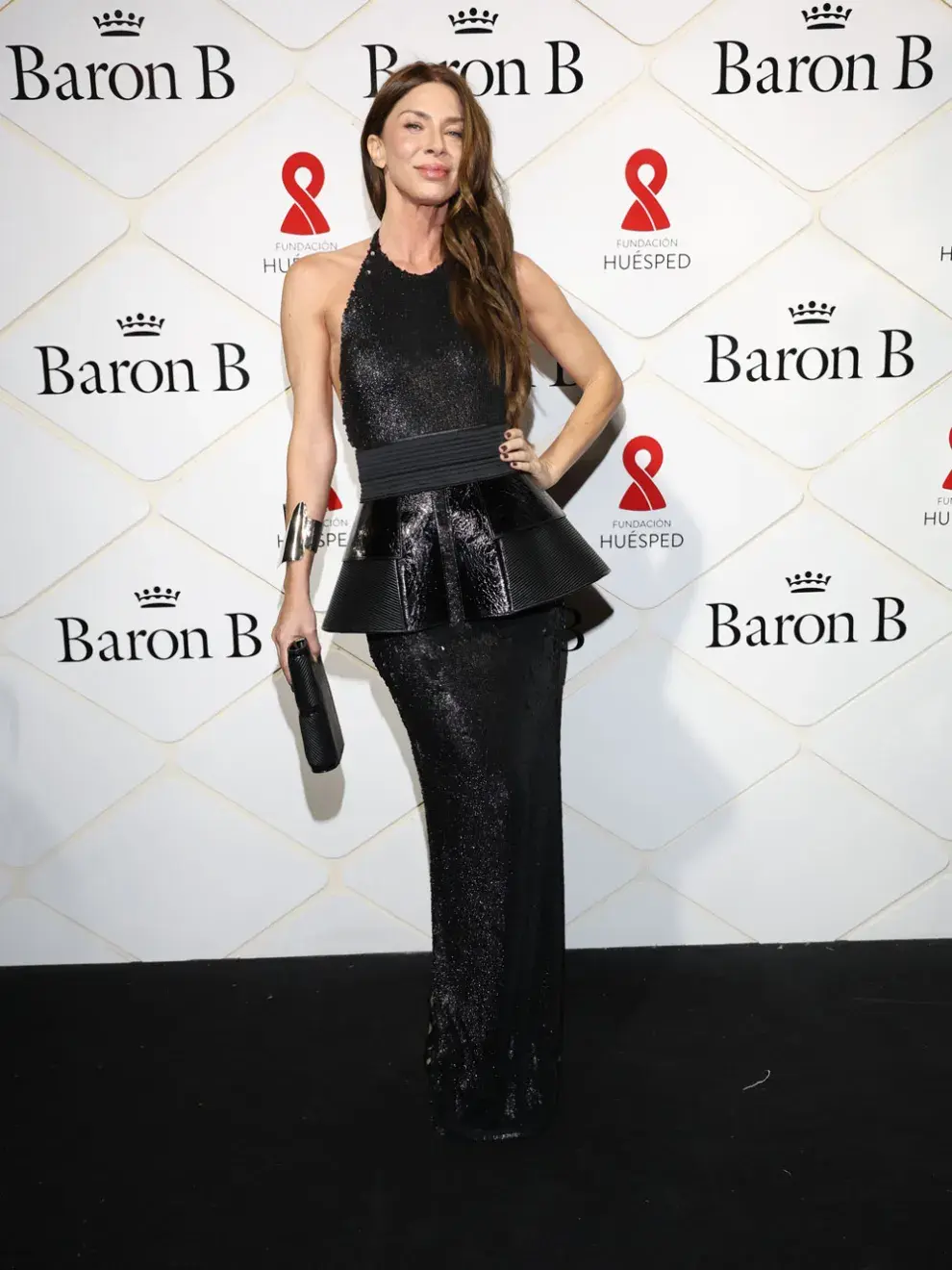 Romina Gaetani, de negro con un diseño estilo Peplum