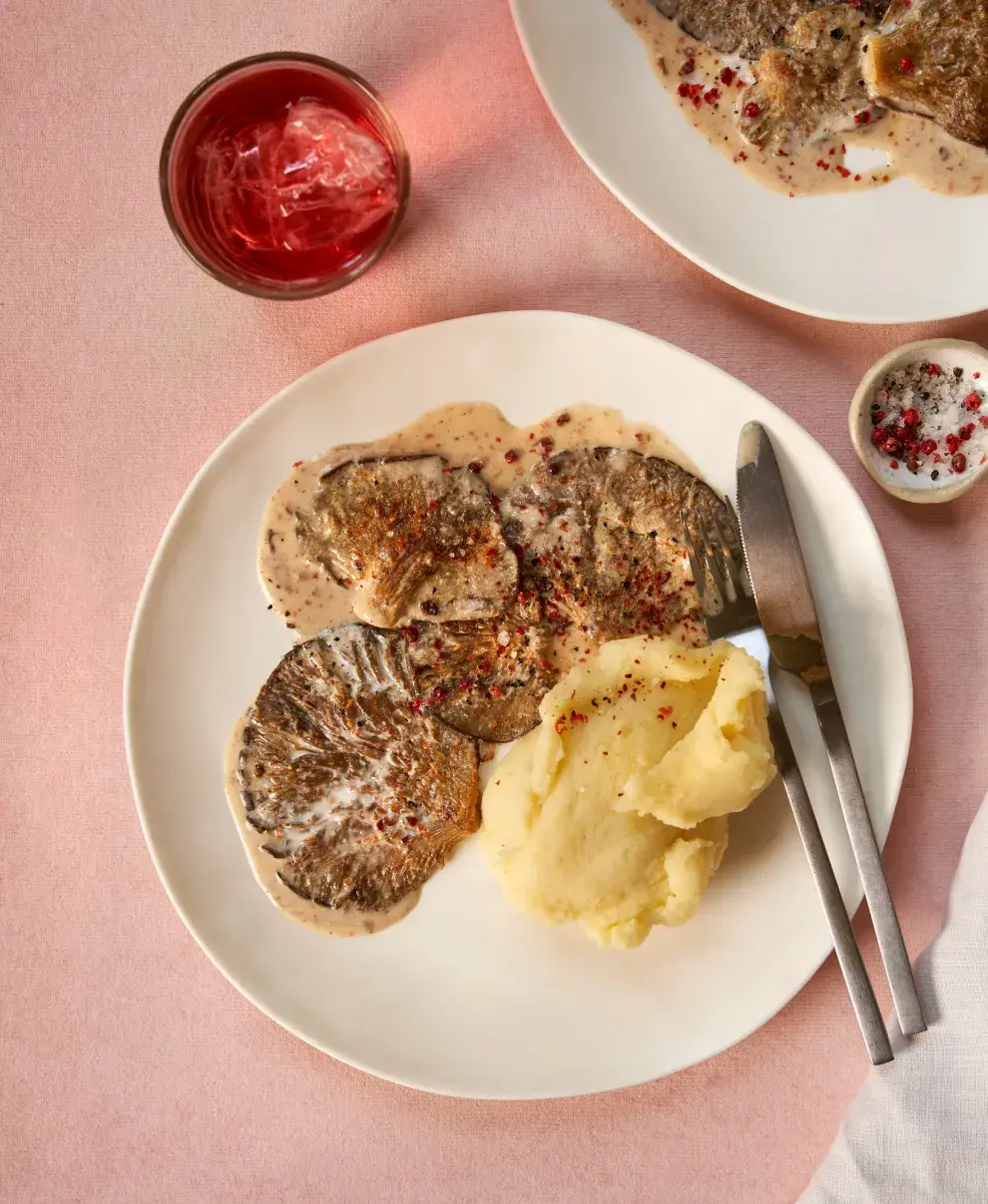  Gírgolas picantes con puré rústico de papas